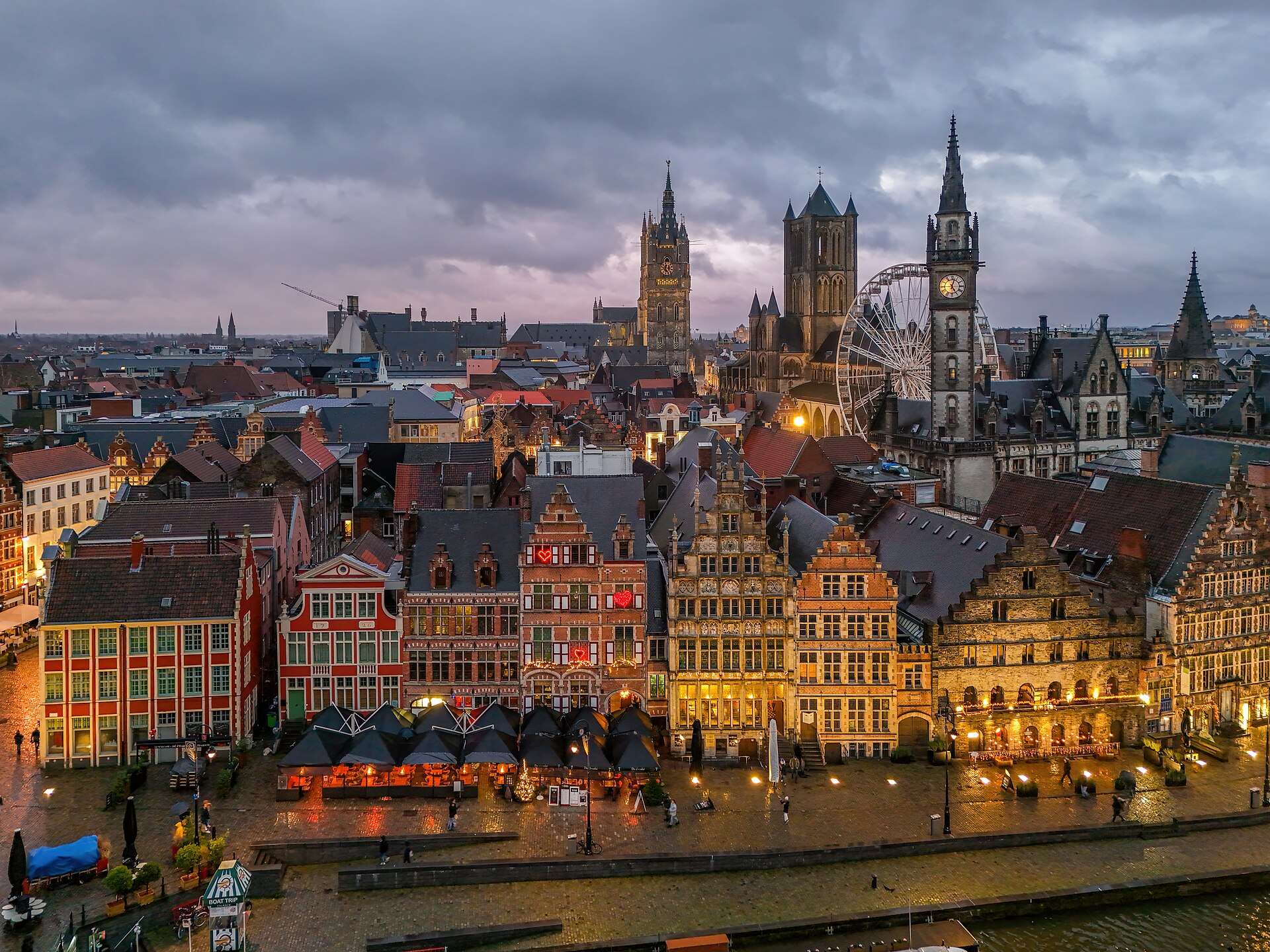 The Graslei and Ghent's three towers at dusk