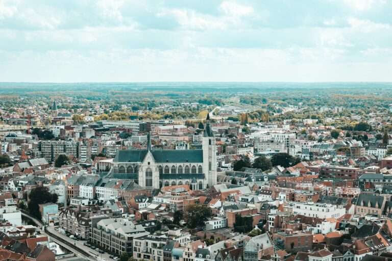 The rooftops and a Gothic church of Mechelen seen from above