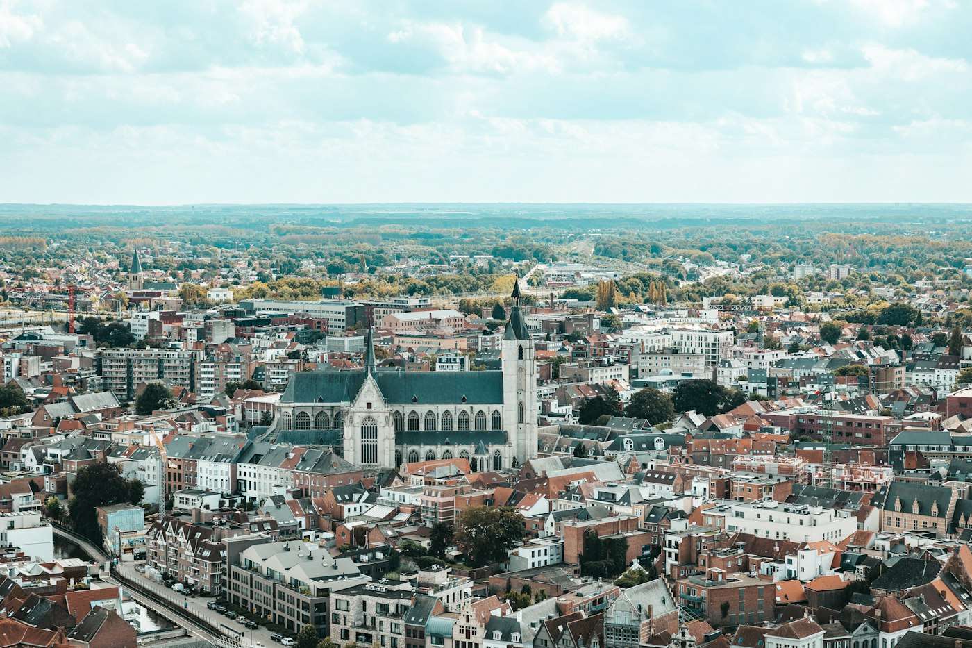 The rooftops and a Gothic church of Mechelen seen from above